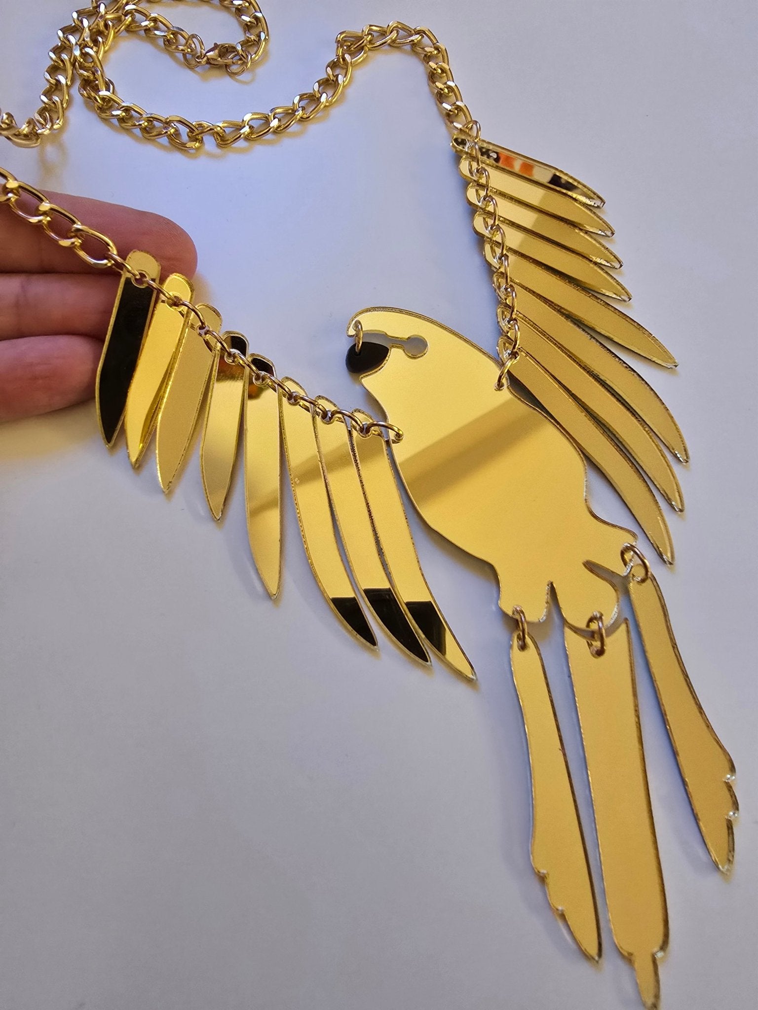 Halsband bird guld - statement halsband akryl - Rino Design Sthlm