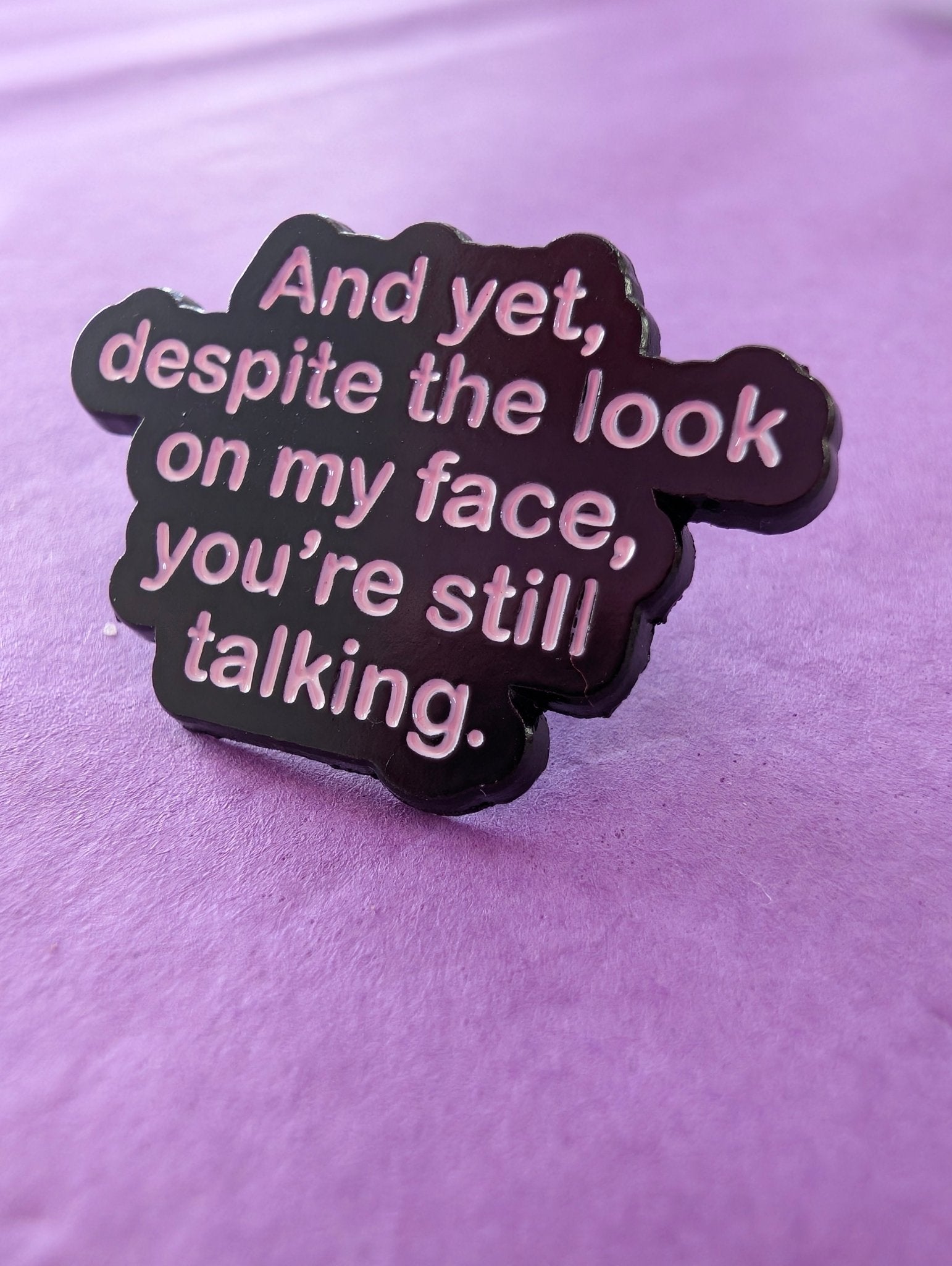 Pin "And Yet Despite the look" Pins i One size från Rino Design Sthlm