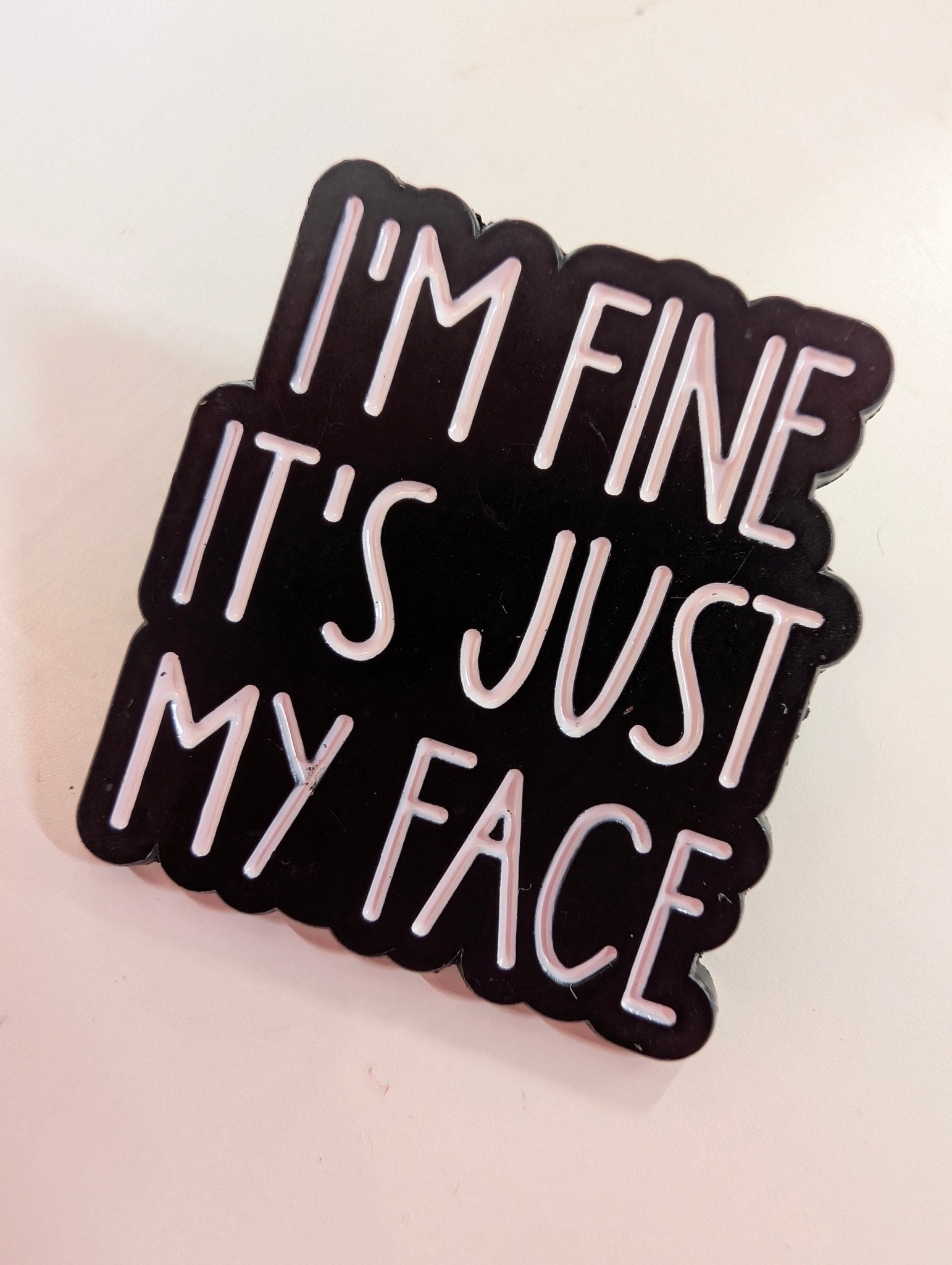 Pin "I'm Fine Just my Face" Pins i One size från Rino Design Sthlm