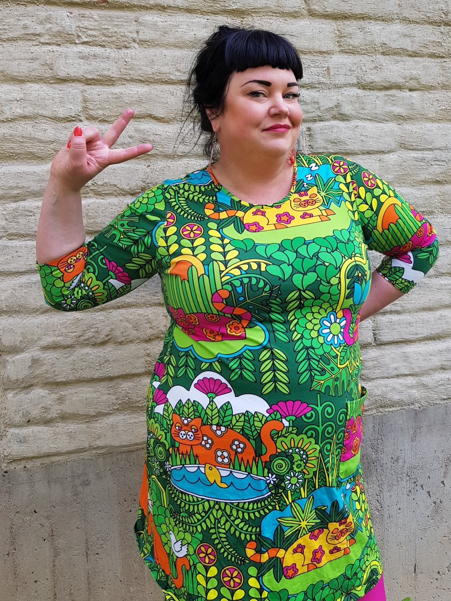 Grön Trikåklänning Katt köper du hos Rino